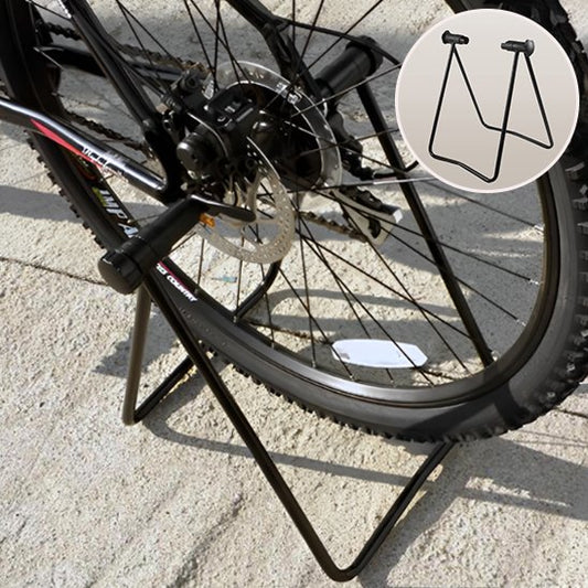 rack à vélo support noir pour entretien velo sur sable avec roue velo arrière