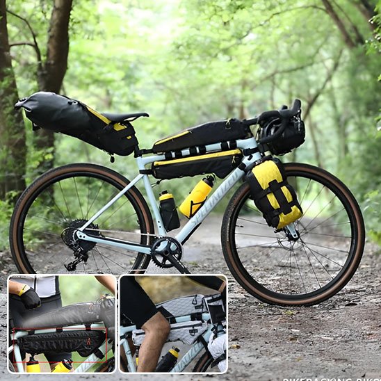 velo blanc avec deux sacoches cadre longueur cadre superieur, deux gourdes jaunes, sacoche de selle volumineuse, sac velo Fork et sacoche velo guidon