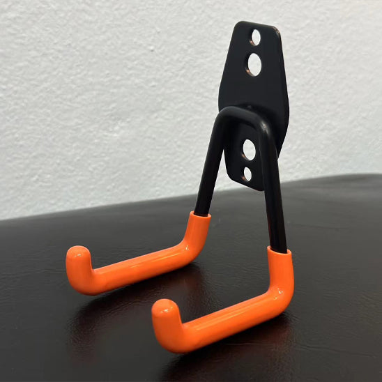 image_crochet_metal_noir_avec_rubber_caoutchouc_de_protection_orange_support_velo_mural_robuste