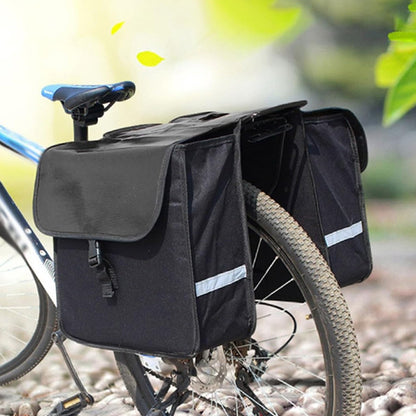 sacoche velo porte bagage sur bicyclette chemin gravier sous arbre