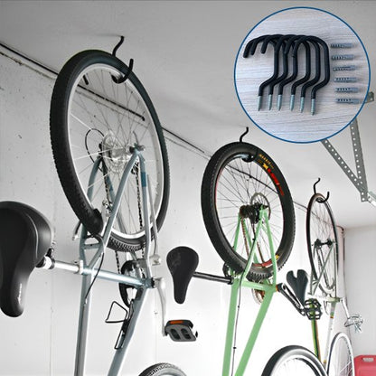 trois velos suspendu au plafond par roue arriere avec support velo mural dans garage