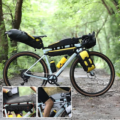velo blanc avec deux sacoches cadre longueur cadre superieur, deux gourdes jaunes, sacoche de selle volumineuse, sac velo Fork et sacoche velo guidon