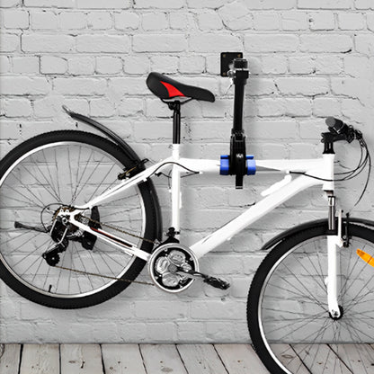 velo_cadre_blanc_eleve_par_support_velo_mural_devant_mur_en_pierres_blanche_et_plancher_bois_blan