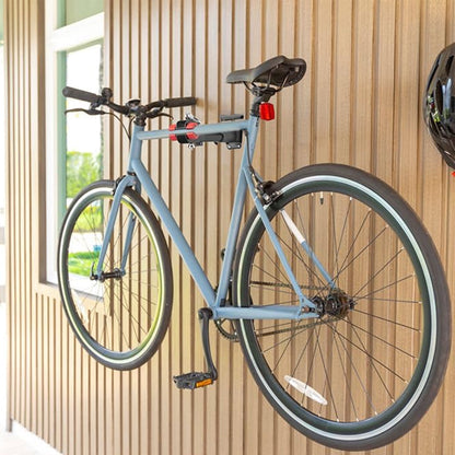 velo_gris_clair_installer_horizontalement_discretement_mur_exterieur_utilisant_petit_support