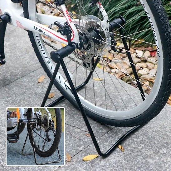 velo monte sur rack a velo noir pliable exterieur sur beton