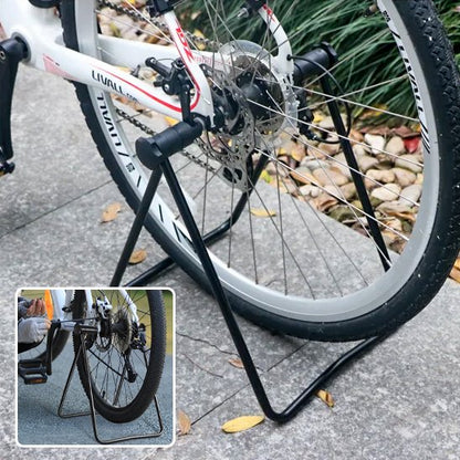 velo monte sur rack a velo noir pliable exterieur sur beton