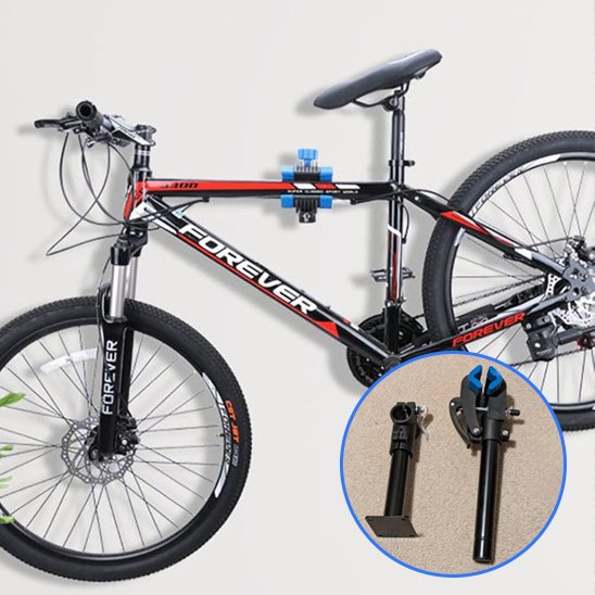 velo rouge noir freins a disque suspendu sur mur blanc par support velo mural